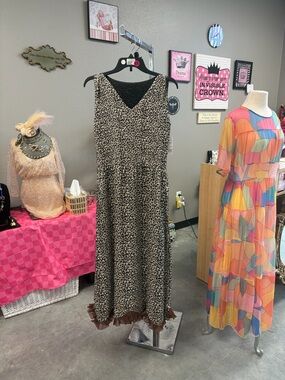 Leopard Print Sleeveless Maxi Dress with Fringe Hem